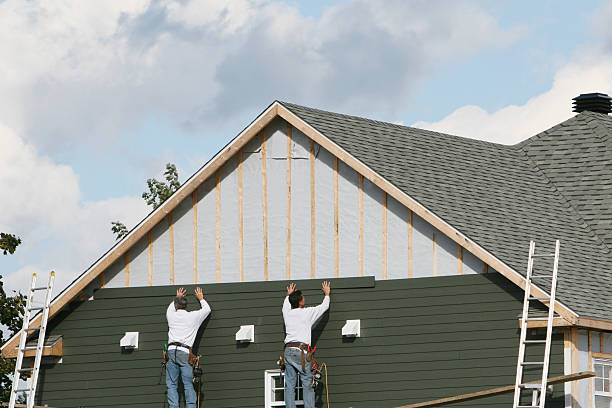 Professional Emergency Siding Repair technician working in Oyster Bay, NY